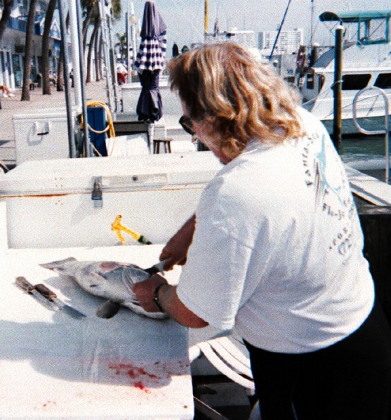 capt_tom_cleaning_grouper.jpg