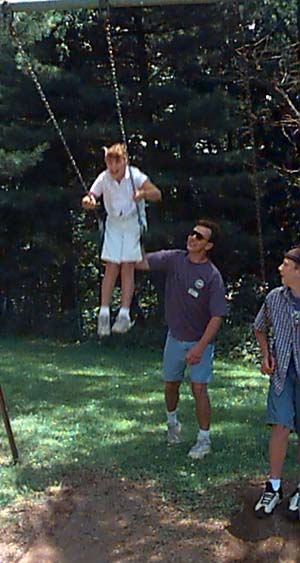 Jeff and Heather on swings